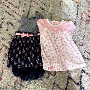 Set of infant girl dresses.